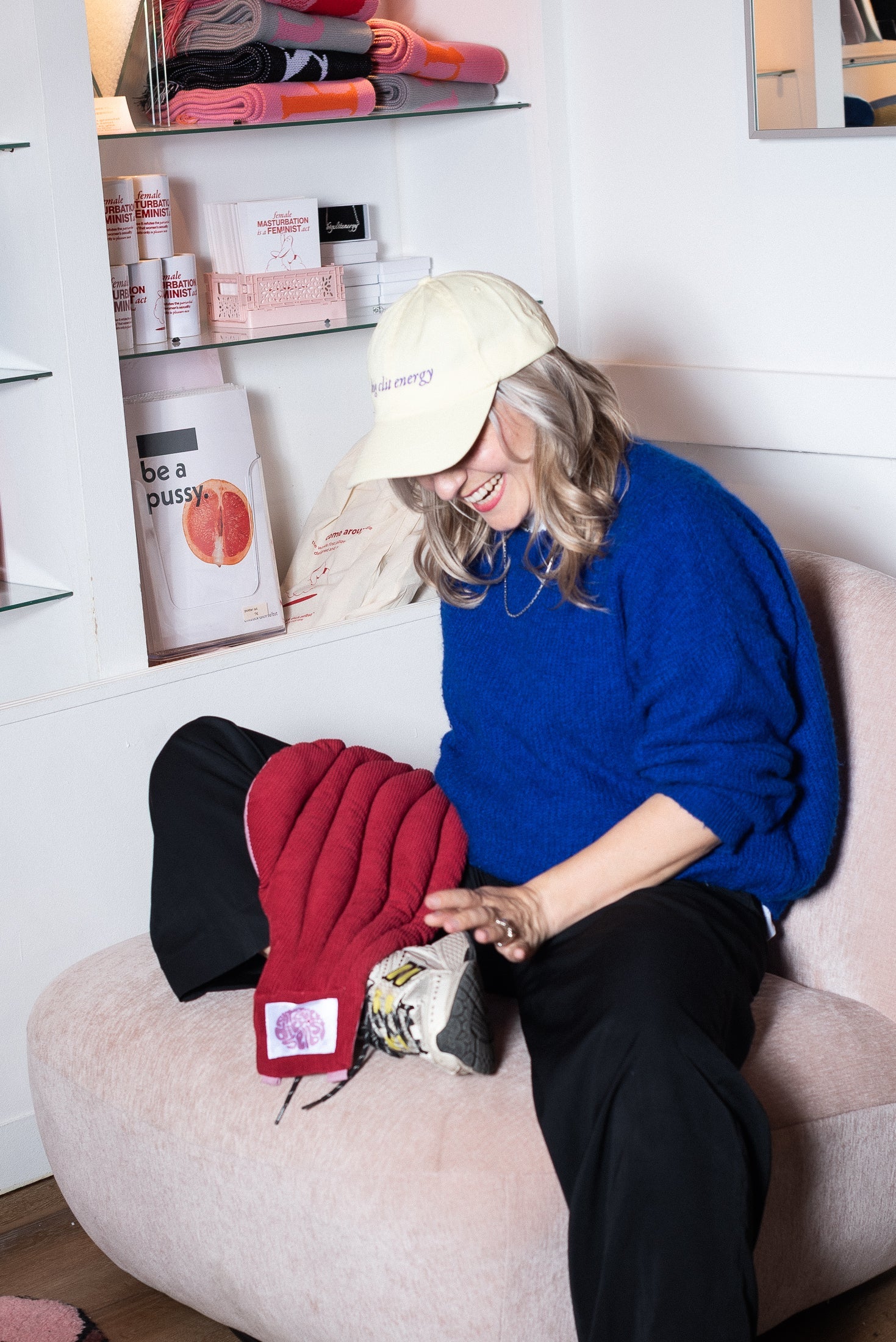 sanja on a chair with the cap on